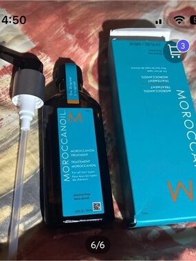 3.4 oz unopened box Moroccanoil Treatment